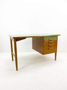 Desk With Green Leaf